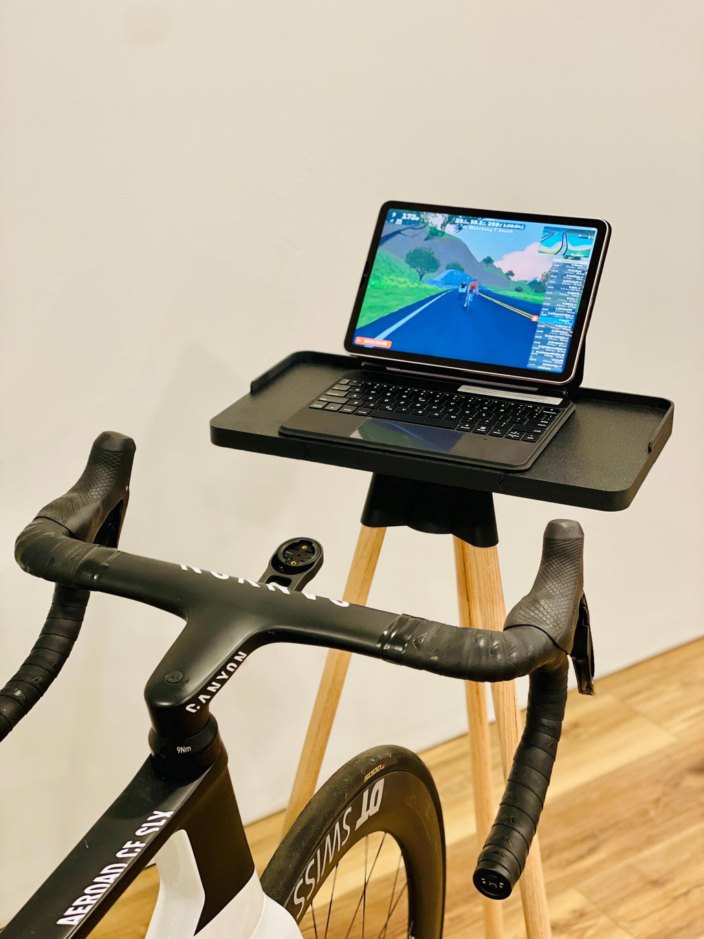 Indoor Cycling Desk: Oak Wood Legs, Bioplastic Top, Minimalist Home Gym, Zwift Stand for Laptop and iPad